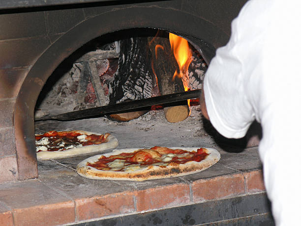 istock Pizza cooked in wood oven 496445577