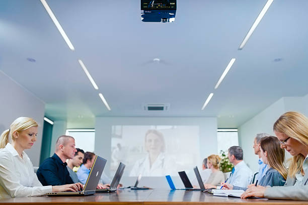 istock Committee Having Video Conference In The Boardroom 496445975