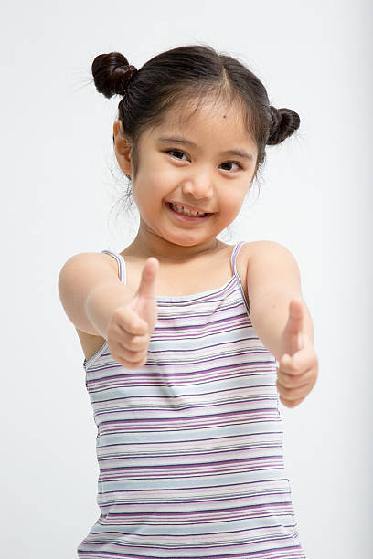istock Pretty confident girl showing thumbs up 496446299