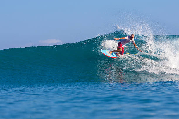 istock Surfing a Wave. Bali Island. Indonesia. 496447945