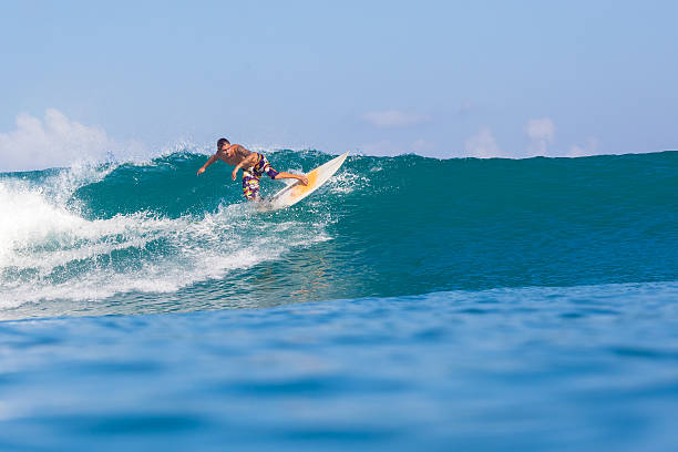 istock Surfing a Wave. Bali Island. Indonesia. 496447947