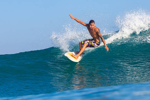 istock Surfing a Wave. Bali Island. Indonesia. 496447967