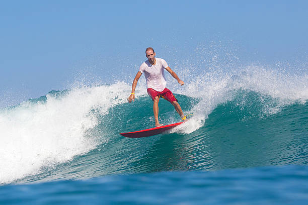 istock Surfing a Wave. Bali Island. Indonesia. 496447969