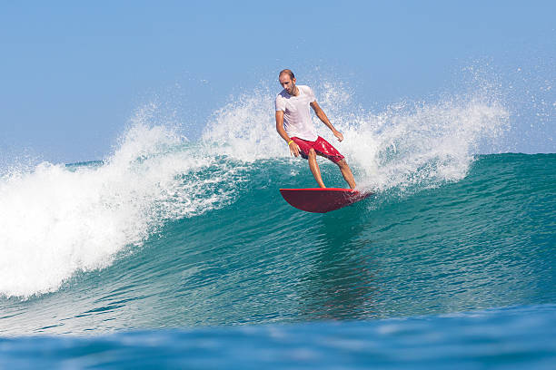 istock Surfing a Wave. Bali Island. Indonesia. 496447971