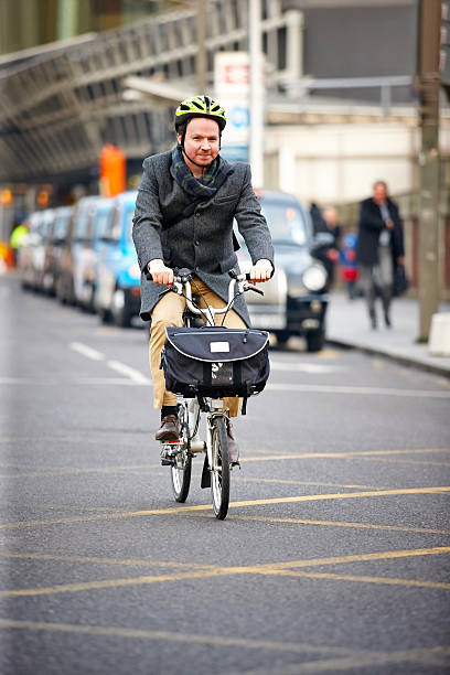 istock Businessman cycling to work 496448403