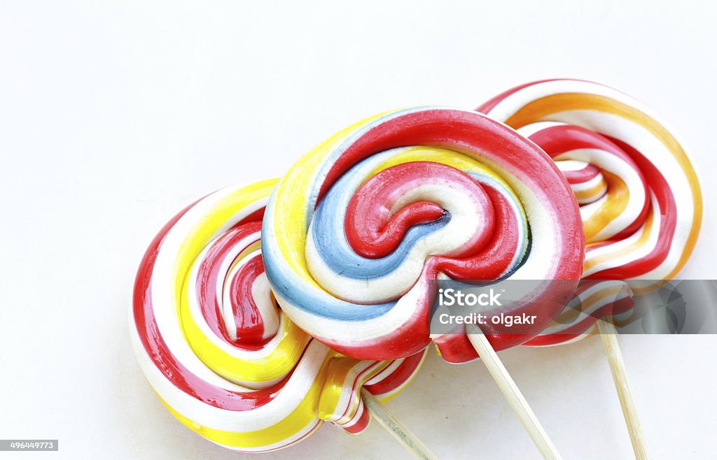 sweet colorful lollipop on a white background Blue Stock Photo