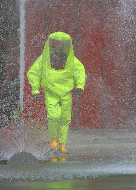 istock fireman with the yellow jumpsuit 496449901
