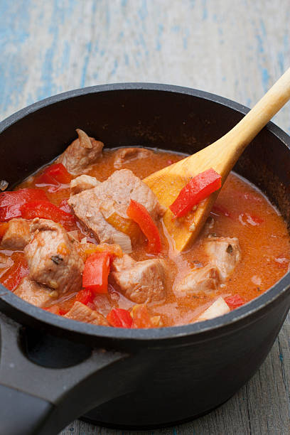 istock Stew with tomatoes, red bell pepper in sauce 496472047