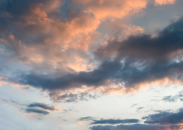 istock The blue sky with golden fluffy clouds 496472215