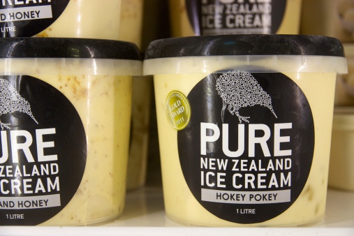 Wellington, New Zealand – November 6, 2013: Containers of hokey pokey ice cream, a local favourite flavour, on the shelves at food shop Moore Wilson's.