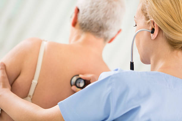 istock Doctor examining senior patient 496474761
