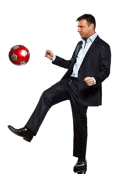 istock one business man playing juggling soccer ball 496475157