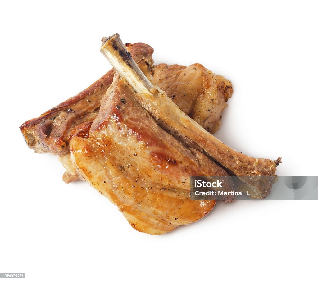 Costolette di maiale alla griglia - Foto stock royalty-free di A forma di croce