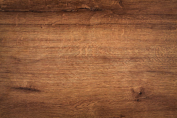 istock Brown Wooden Desk Background 496483036