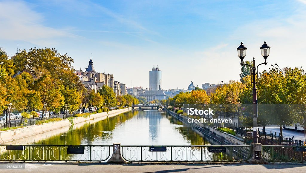 River Dambovita in Bucharest, Romania River Dambovita in Bucharest, Romania with the city skyline and colorful trees in foliage Bucharest Stock Photo