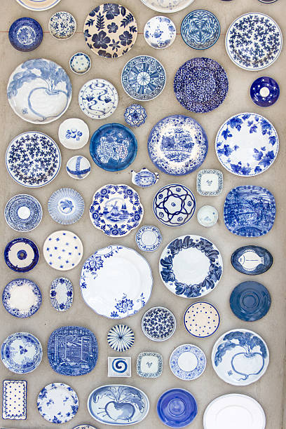 istock Porcelain plates placed on the cement floor for background. 496486434