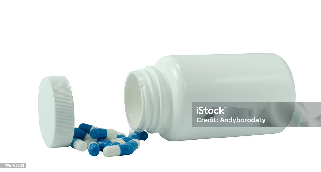 some pills of a white and blue colors with white jar some pills of a white and blue colors with white jar on a white background 2015 Stock Photo