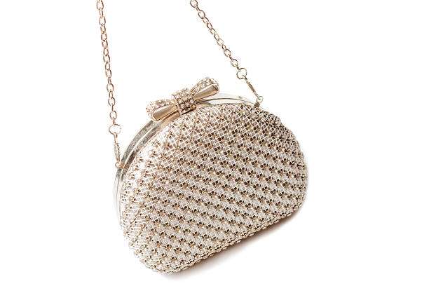 istock White clutch with diamonds on isolated white background 496487510