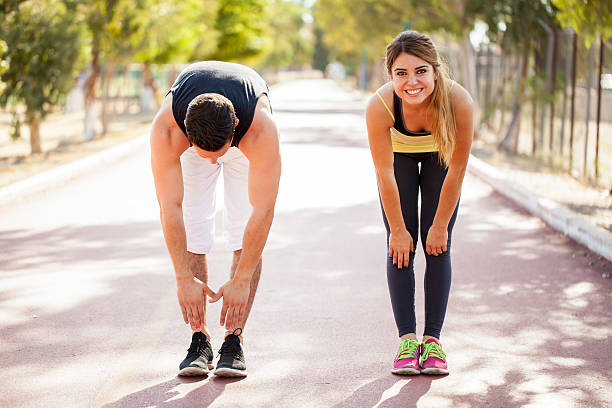 istock Cute couple working out together 496488316
