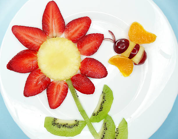 istock creative fruit child dessert bee on the flower form 496489200