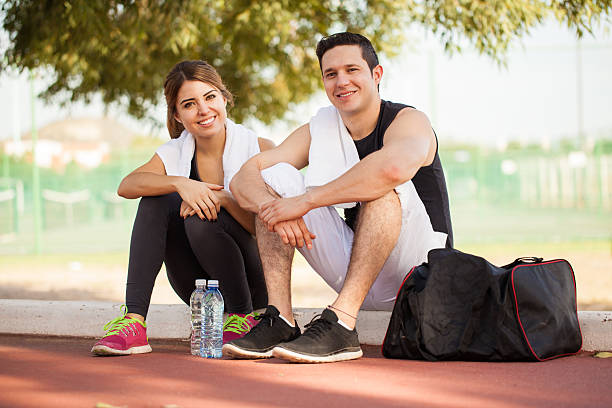 istock Happy couple relaxing after exercising 496490560