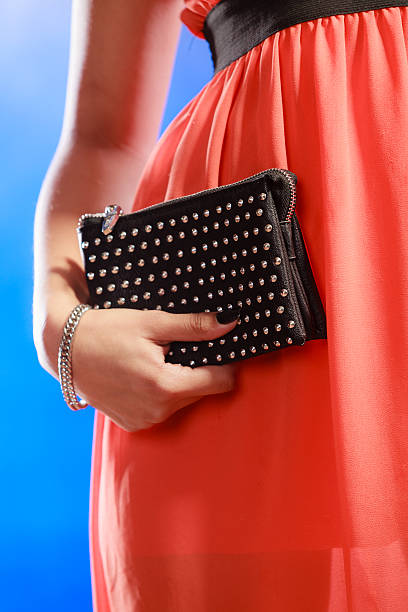 istock Evening handbag in woman hand 496490678
