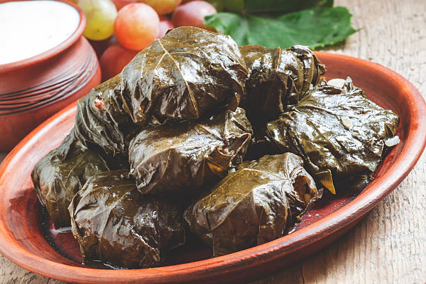 istock Traditional Greek dolma with meat in grape leaves 496492244
