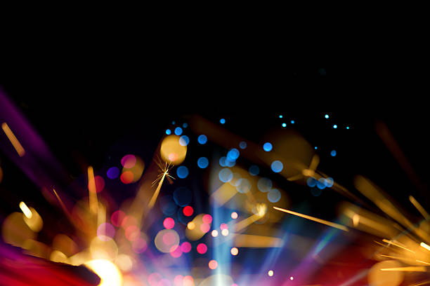 Multi Colored Sparkler Background Multi Colored Sparkler Background long exposure photos stock pictures, royalty-free photos & images