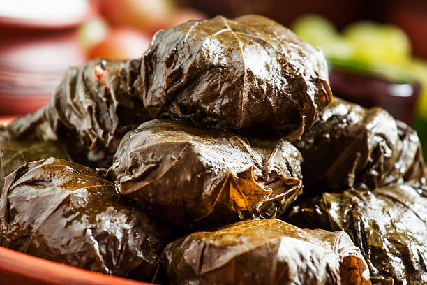 istock Traditional Greek dolma with meat in grape leaves 496492738