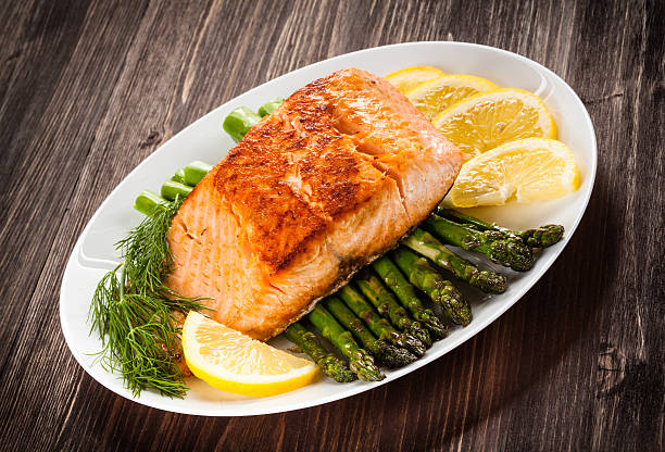 istock Grilled salmon and vegetables 496510354