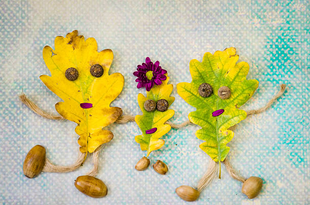 istock family concept from beech autumn leaves 496510608