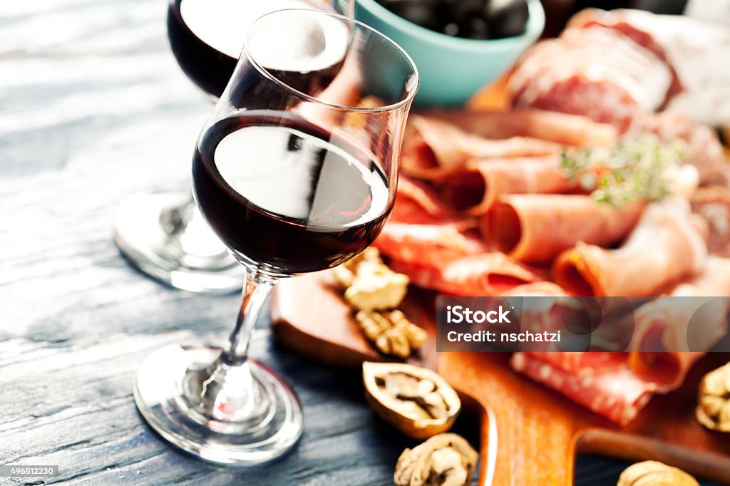 Wine party Red wine with charcuterie assortment on the background Wine Stock Photo