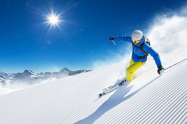 istock Skier skiing downhill in high mountains 496512870