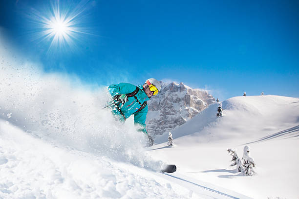istock Skier skiing downhill in high mountains 496513072