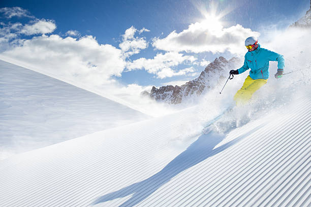 istock Skier skiing downhill in high mountains 496513160