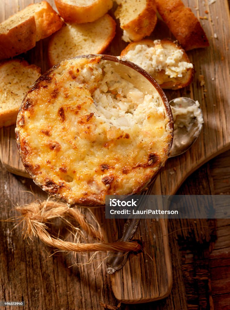 Baked Creamy Crab Dip with three Cheeses Creamy Crab Dip with Crusty Bread  -Photographed on Hasselblad H3D2-39mb Camera Dipping Sauce Stock Photo