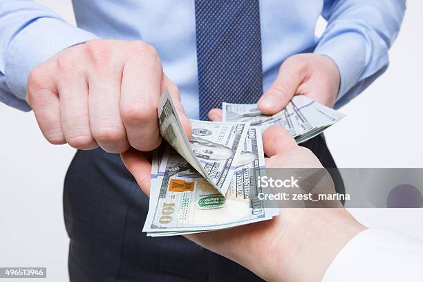 Human Hands Exchanging Money Stock Photo - Download Image Now - Currency, Giving, Paper Currency