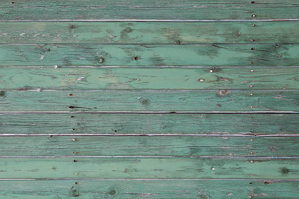 istock Painted turquoise wooden background 496514188