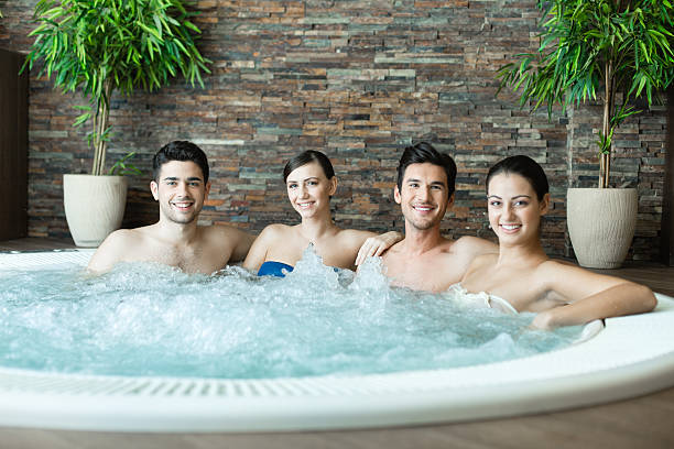 istock Friends sharing hot tub 496515013