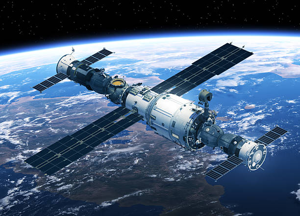 istock Space Station And Spacecrafts Orbiting Earth 496515238