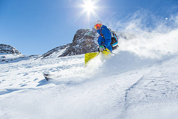 istock Skier skiing downhill in high mountains 496516092