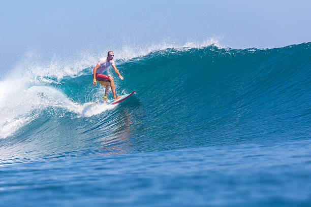 istock Surfing a Wave. Bali Island. Indonesia. 496517329