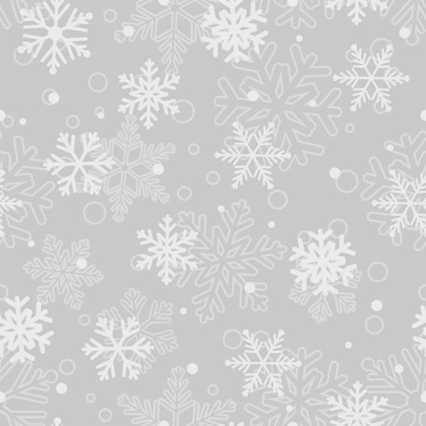 Seamless pattern of snowflakes, white on gray Christmas seamless pattern of big and small snowflakes, white on gray. Vector illustrations. EPS10, JPG and AI10 are available snowflake shape patterns stock illustrations