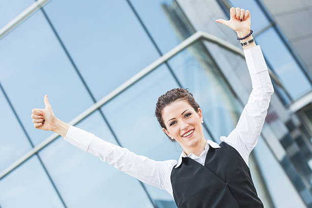 istock Successful Businesswoman in front Office Buildings 496517885