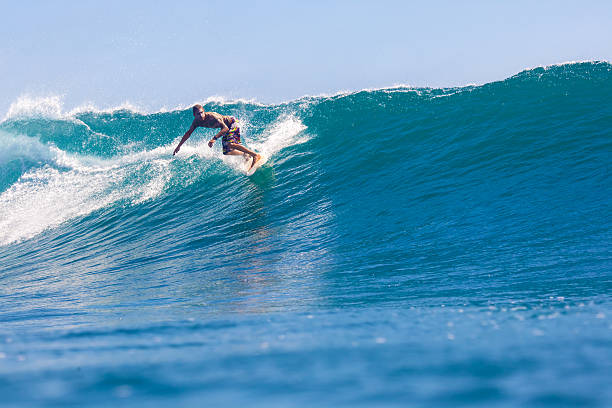 istock Surfing a Wave. Bali Island. Indonesia. 496519377