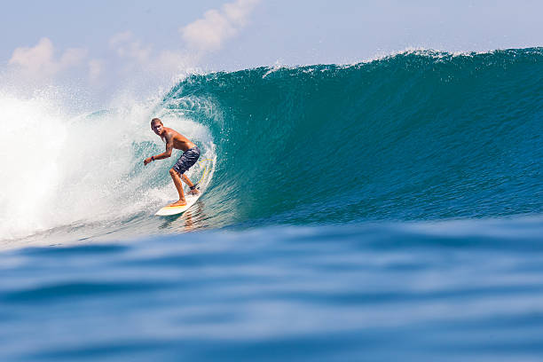 istock Surfing a Wave. Bali Island. Indonesia. 496519449