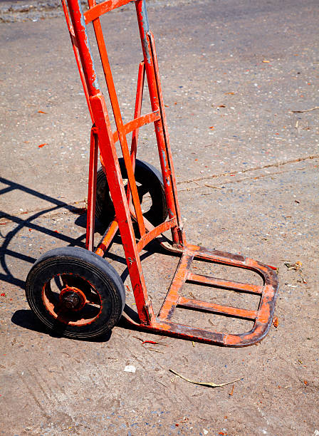 istock red wheelbarrow in thai market 496519983