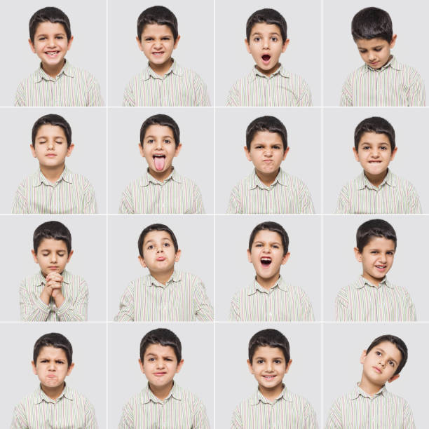istock Cute little boy making various facial expressions 496523222