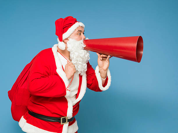 istock St Nicholas Holding Gift Boxes And Shouting Via Megphone 496523968