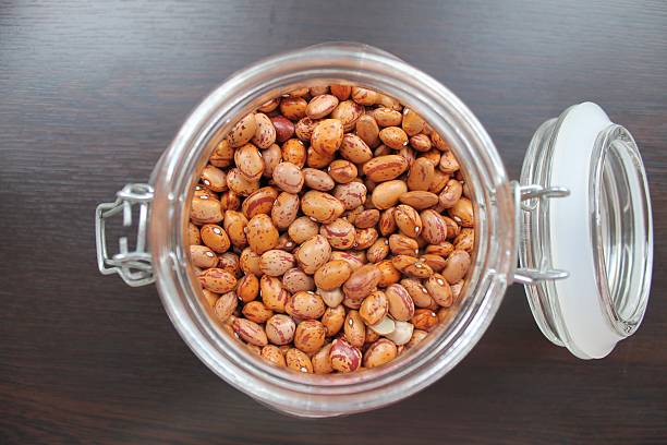istock Dried red beans in a glass jar on the table 496524748